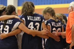 WMS Volleyball takes a time out to discuss next play.